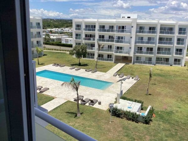 A view of an apartment complex from the window.